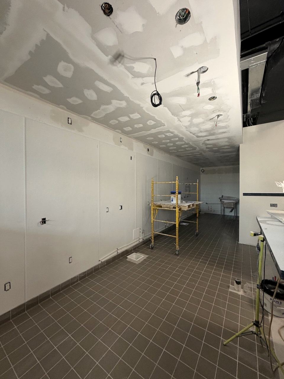 Construction in progress — drywall and ceiling work